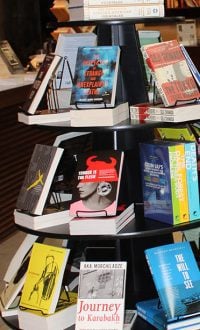Featured Books A circular book stand with featured books in Clevo Books Cleveland bookstore